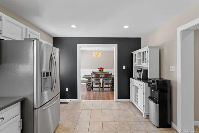 a view of a livingroom with furniture and furniture