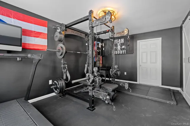 a large white building with a white pool in front of it