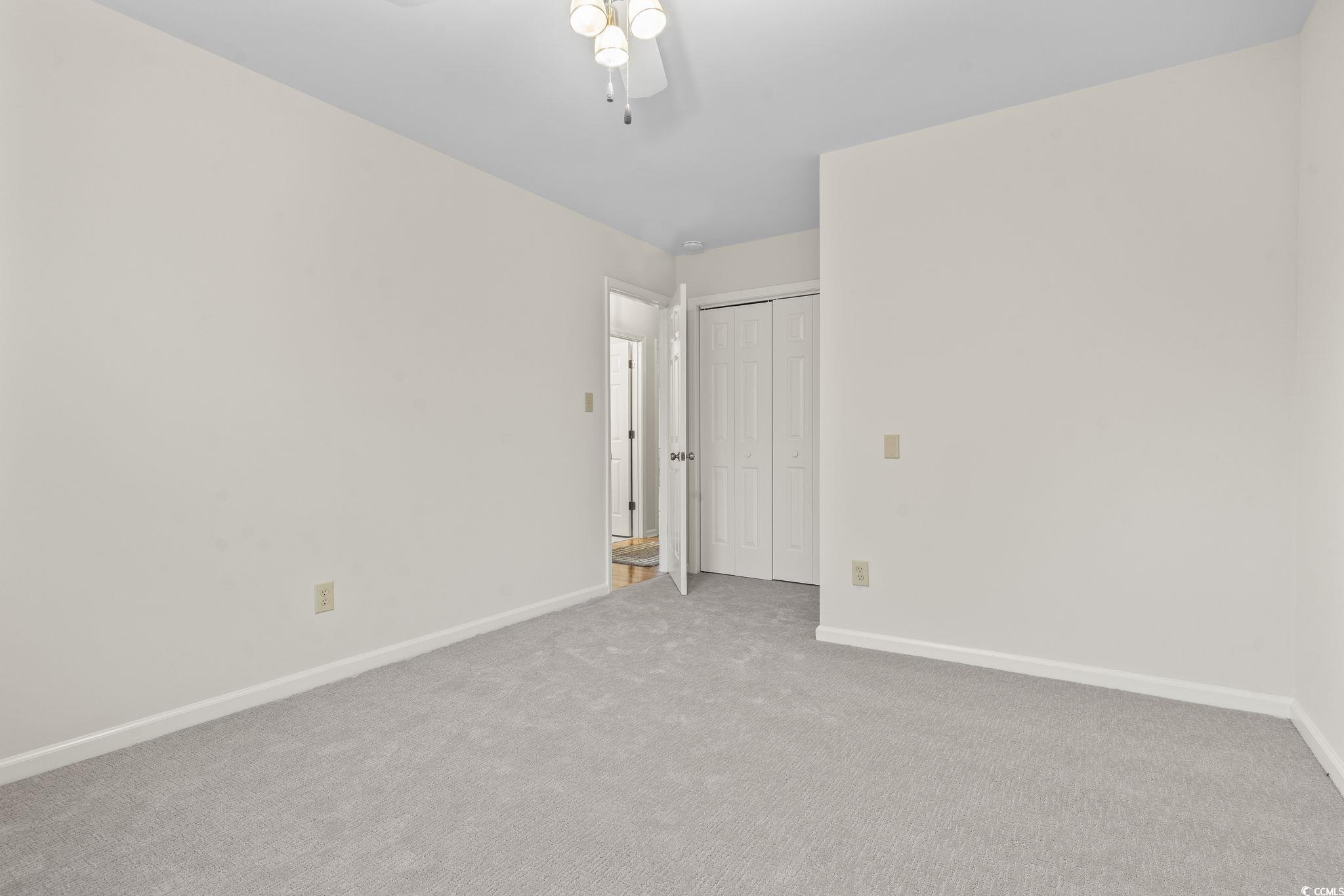 116 Purple Martin Drive Murrells Inlet, SC 29576 - Photo 12 of 40 Carpeted empty room featuring ceiling fan