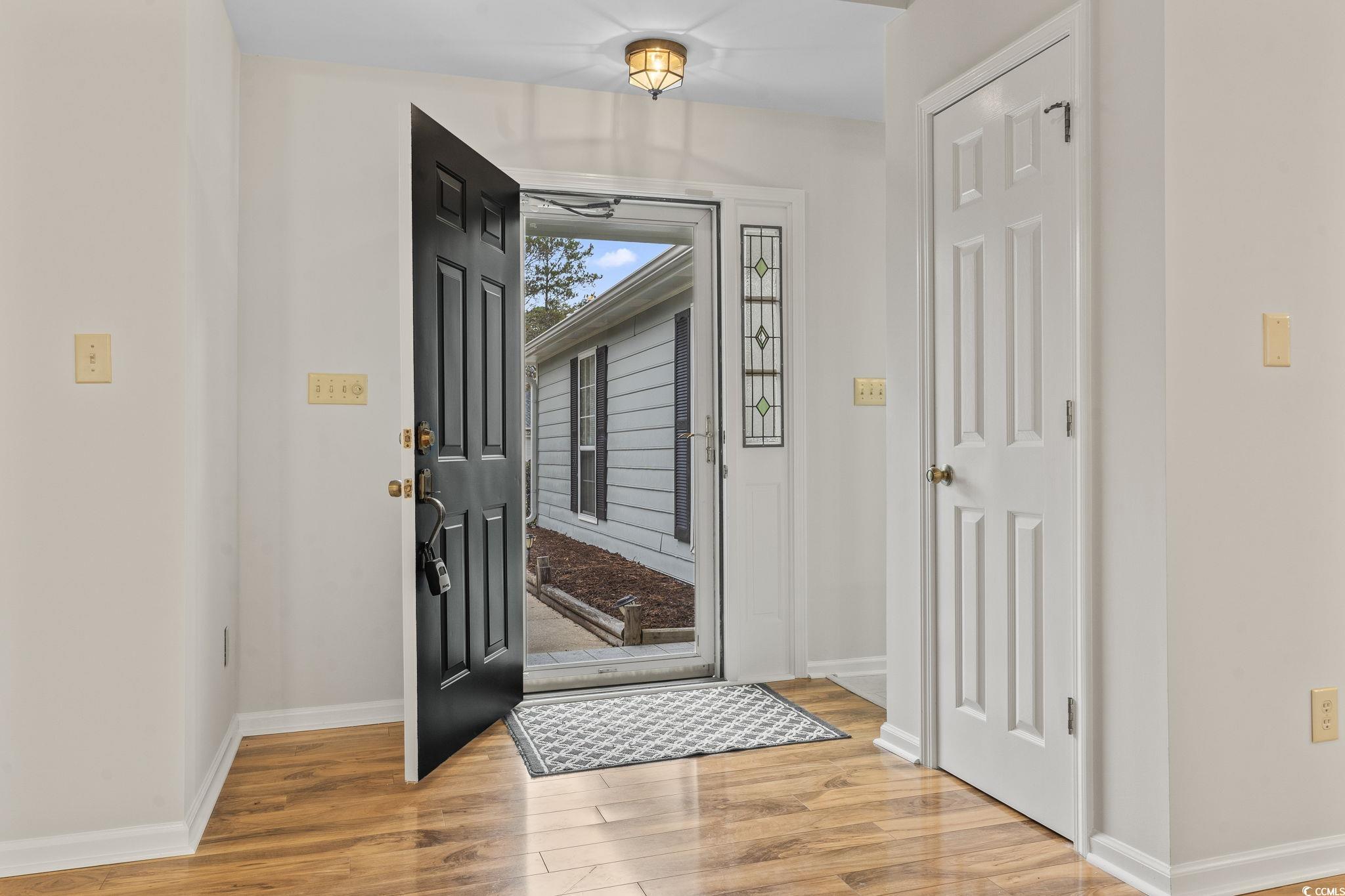 116 Purple Martin Drive Murrells Inlet, SC 29576 - Photo 13 of 40 Entryway with light hardwood / wood-style flooring