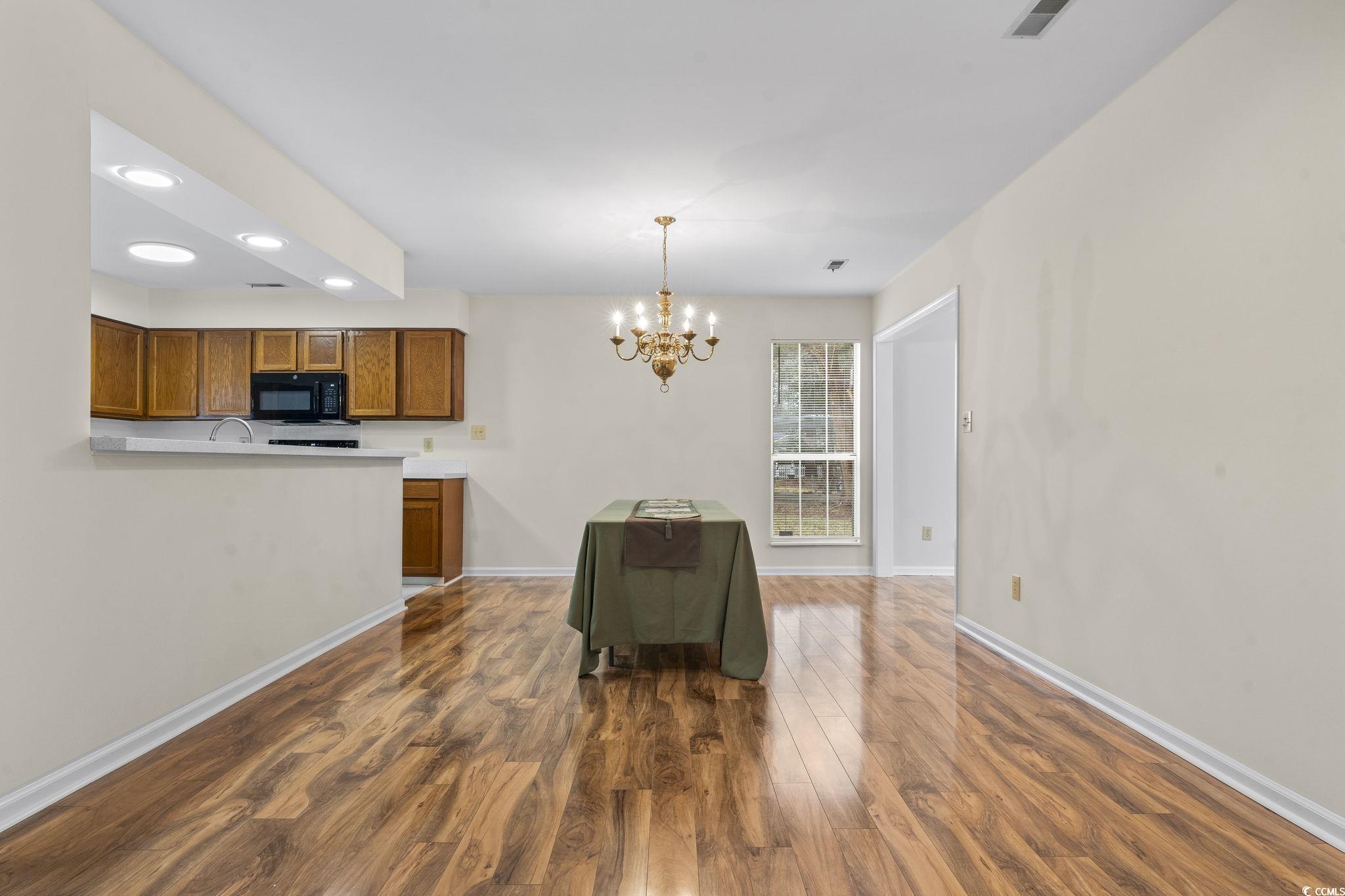 116 Purple Martin Drive Murrells Inlet, SC 29576 - Photo 16 of 40 Dining area with dark hardwood / wood-style floors