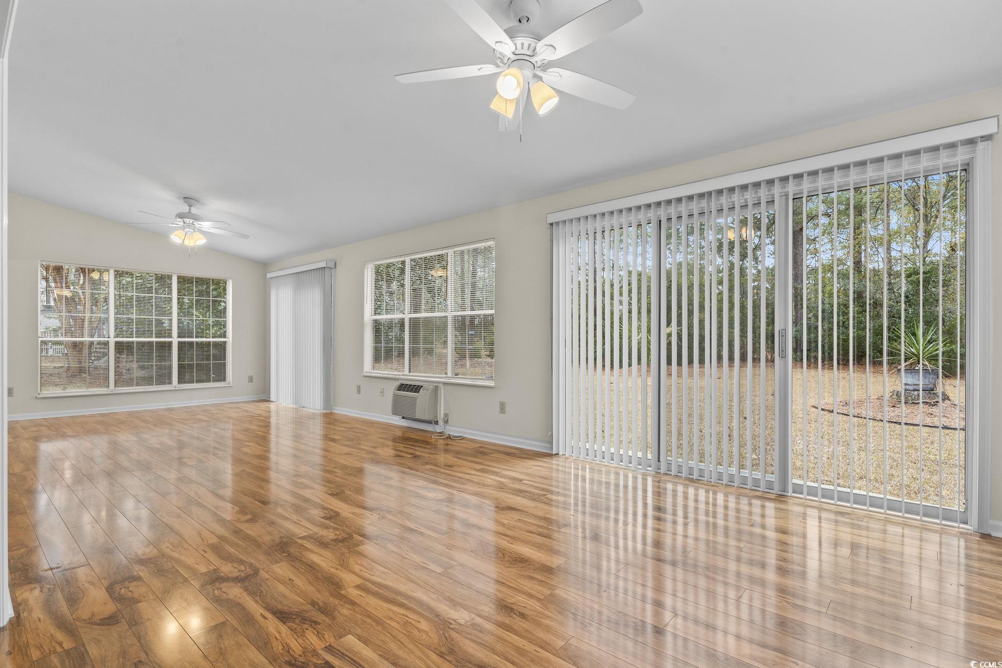 116 Purple Martin Drive Murrells Inlet, SC 29576 - Photo 17 of 40 Unfurnished living room featuring ceiling fan, har