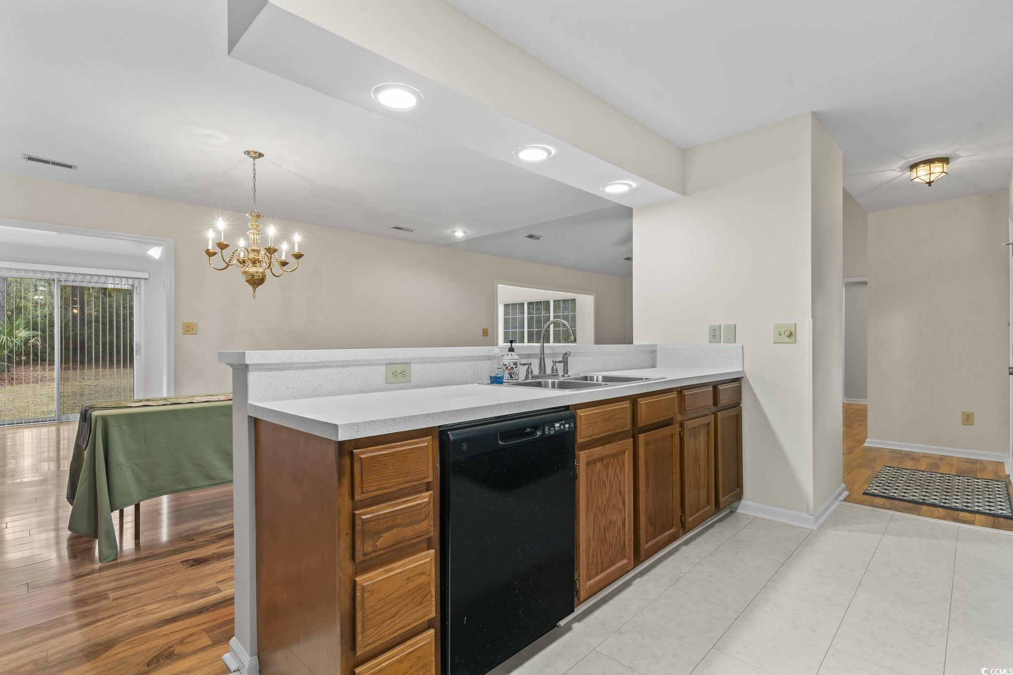 116 Purple Martin Drive Murrells Inlet, SC 29576 - Photo 24 of 40 Kitchen with pendant lighting, an inviting chandel