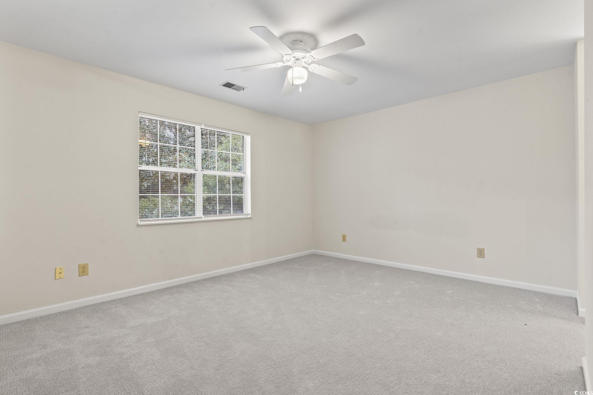 116 Purple Martin Drive Murrells Inlet, SC 29576 - Photo 3 of 40 Carpeted empty room featuring ceiling fan