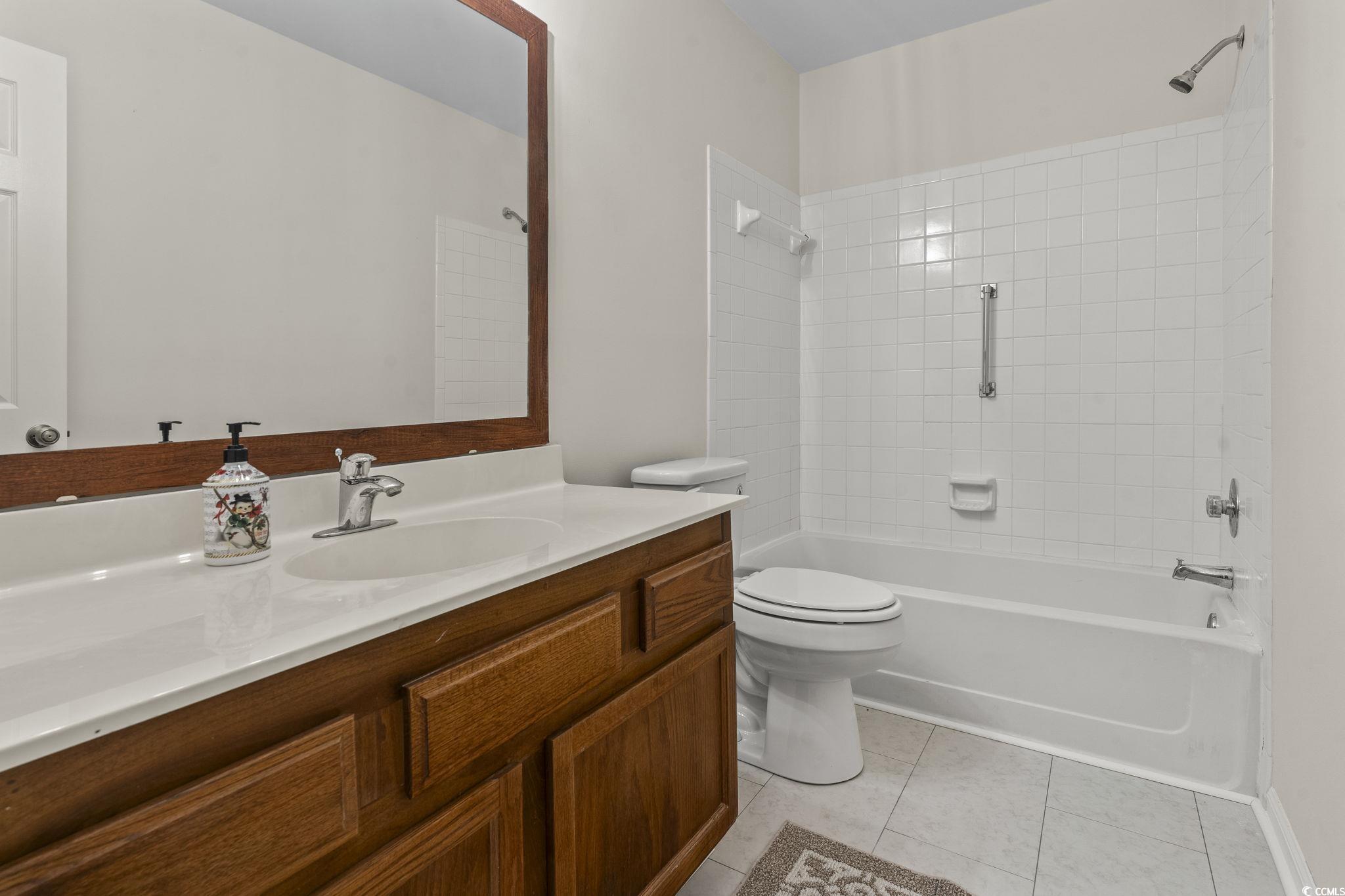 116 Purple Martin Drive Murrells Inlet, SC 29576 - Photo 8 of 40 Full bathroom with tile patterned flooring, vanity