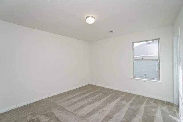 an empty room with a window