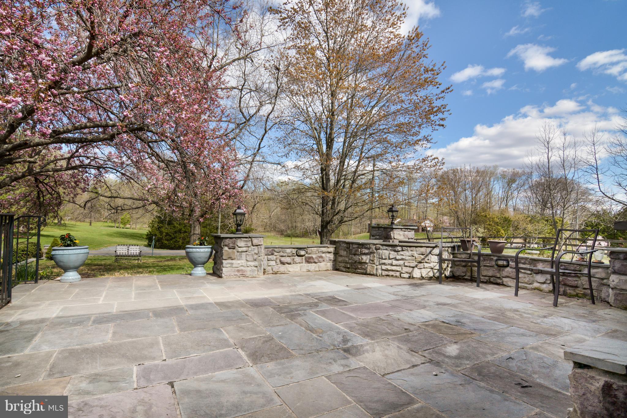 front slate porch under beautiful old cherry tree