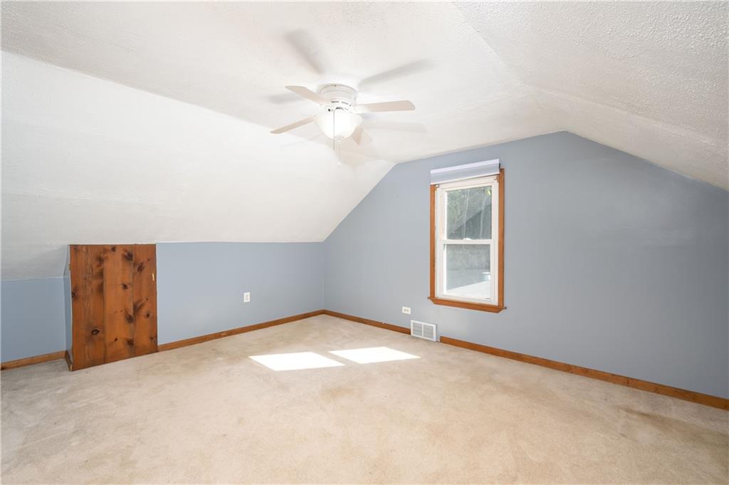 825 Reno Street Rochester, PA 15074 - Photo 16 of 23 an empty room with windows and fan