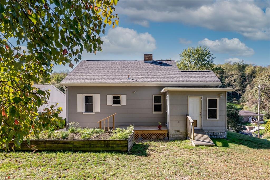 825 Reno Street Rochester, PA 15074 - Photo 20 of 23 a front view of a house with a yard