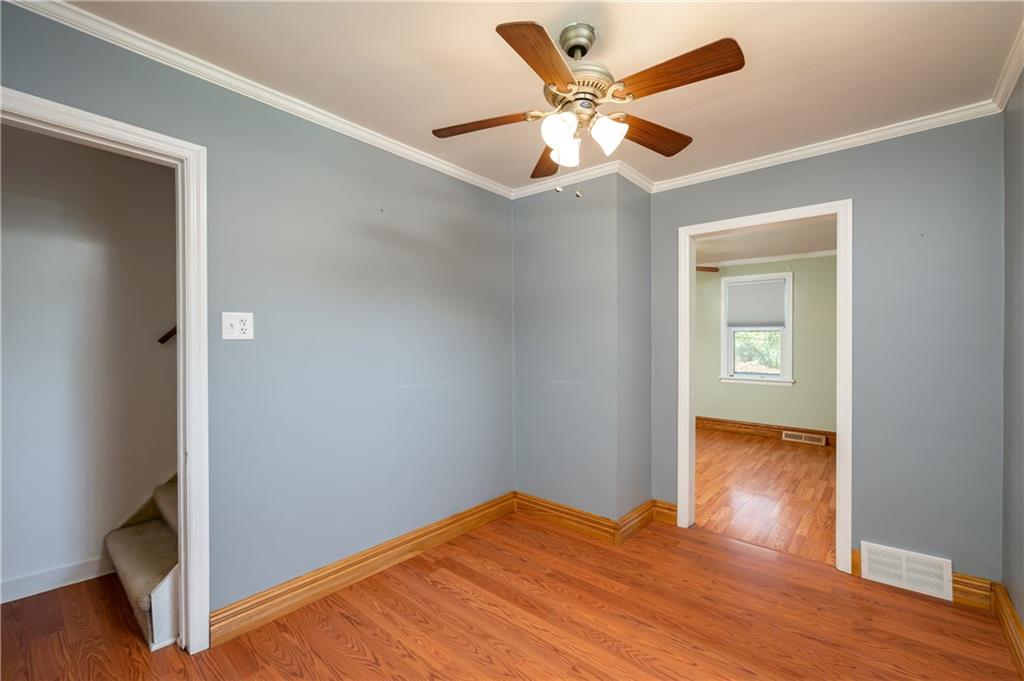 825 Reno Street Rochester, PA 15074 - Photo 7 of 23 a view of empty room with wooden floor