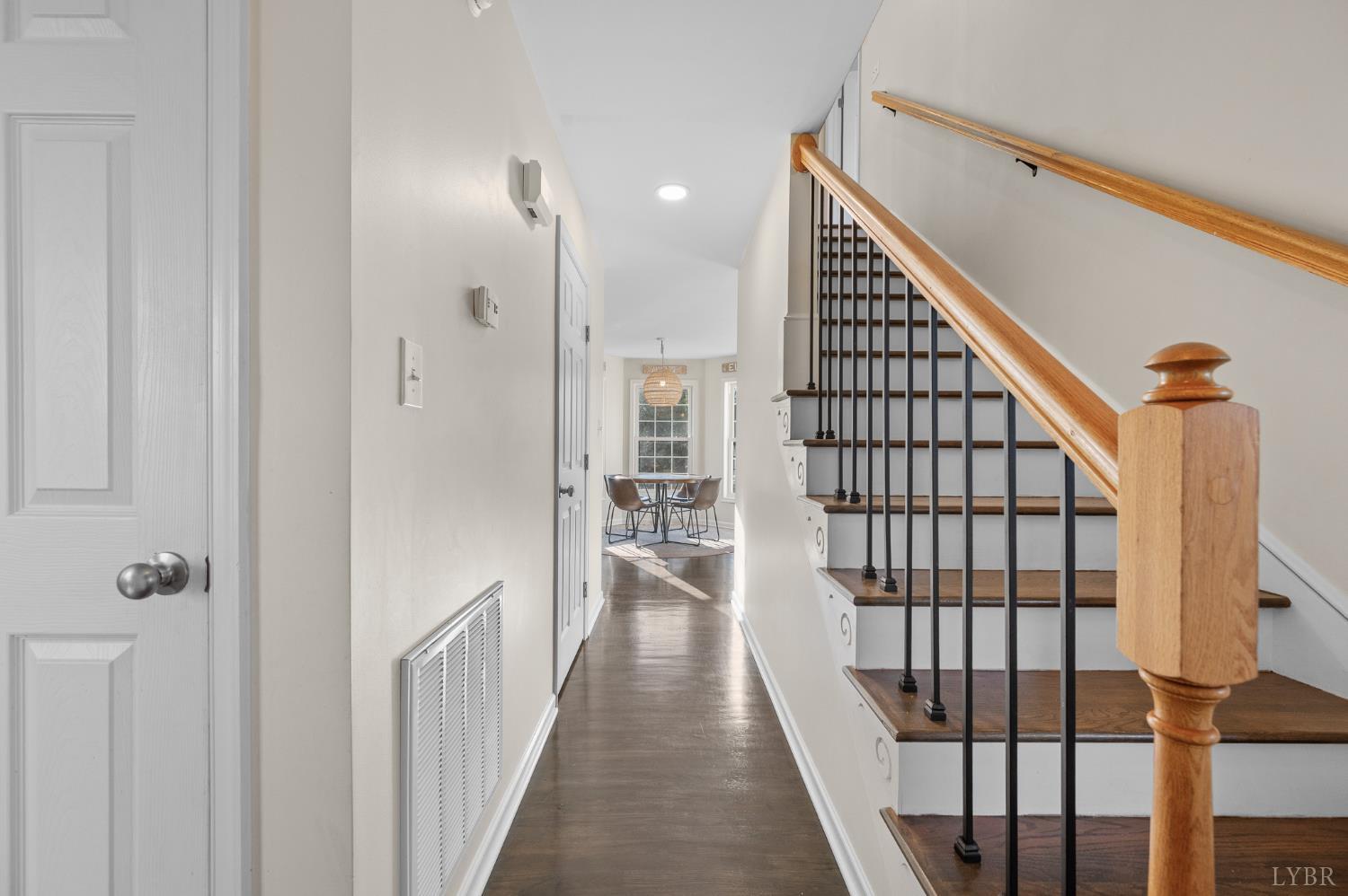 2389 New Chapel Road Rustburg, VA 24588 - Photo 17 of 73 a view of a hallway with wooden floor and staircase