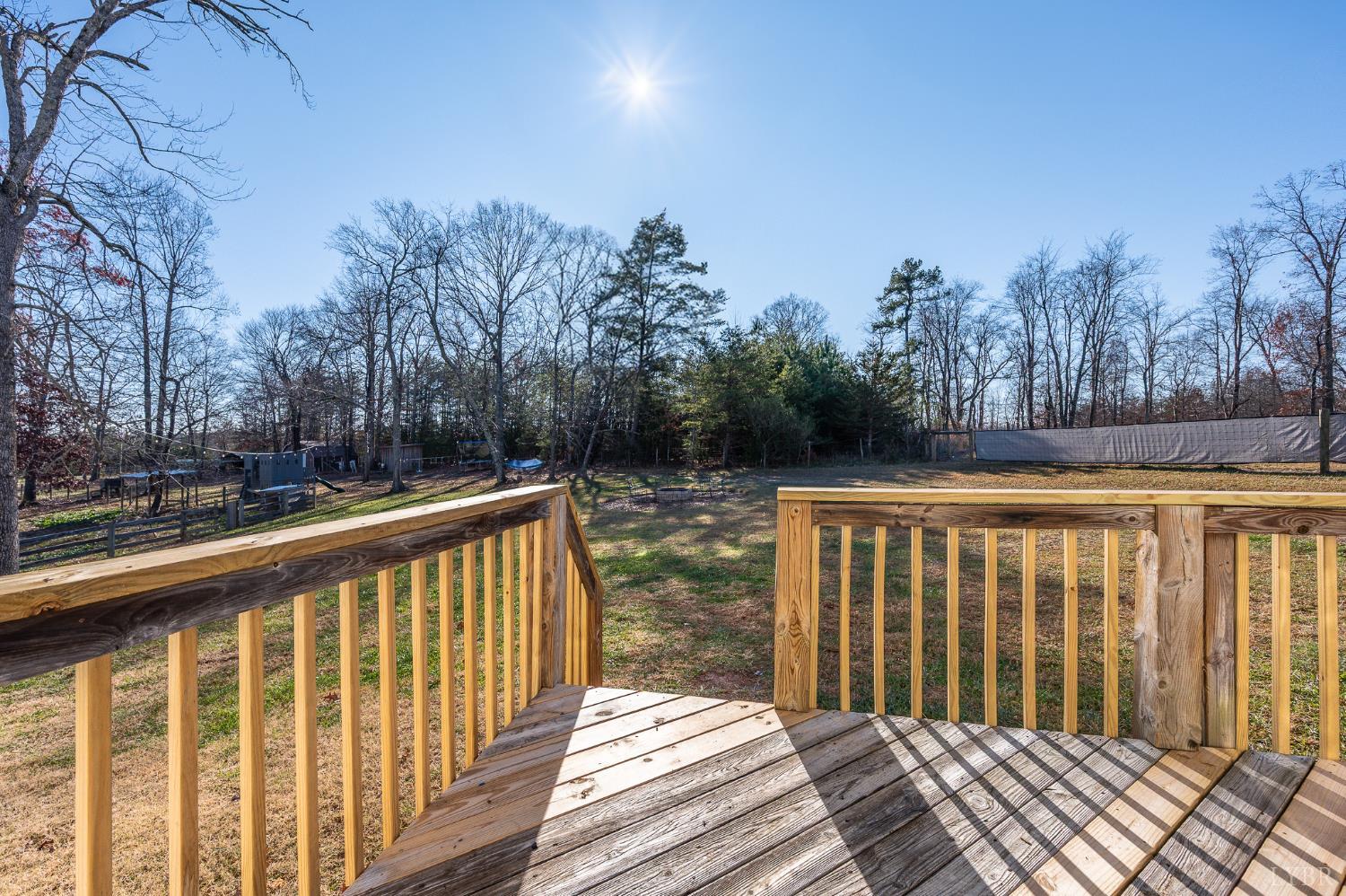 2389 New Chapel Road Rustburg, VA 24588 - Photo 53 of 73 a view of balcony with wooden floor and outdoor space
