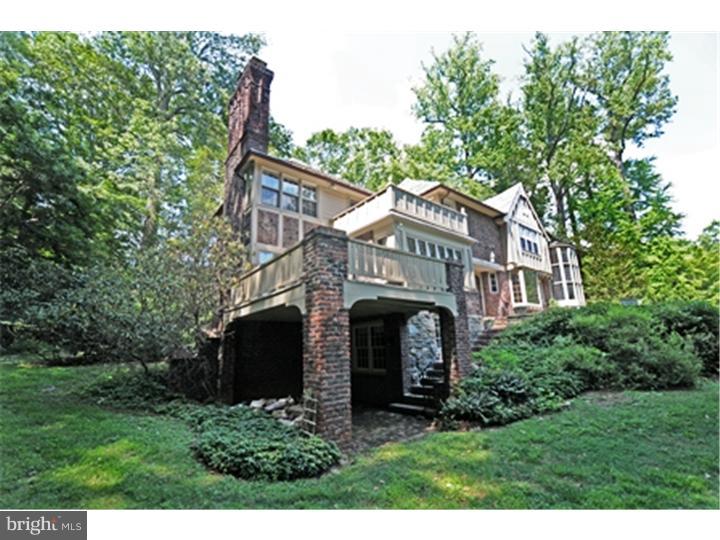 1106 Beech Road Bryn Mawr, PA 19010 - Photo 2 of 21 a front view of a house with a garden