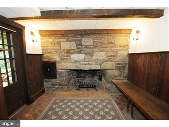 1106 Beech Road Bryn Mawr, PA 19010 - Photo 16 of 21 a view of living room with furniture and a fireplace
