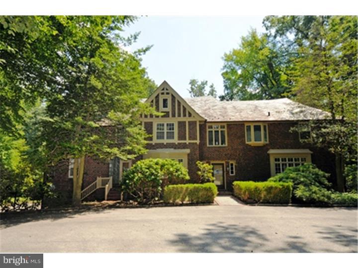 1106 Beech Road Bryn Mawr, PA 19010 - Photo 18 of 21 a view of a house with a tree and plants