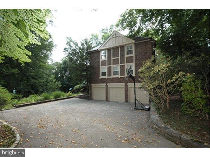 1106 Beech Road Bryn Mawr, PA 19010 - Photo 19 of 21 a view of a house with a backyard