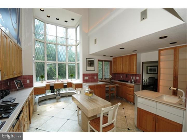 1106 Beech Road Bryn Mawr, PA 19010 - Photo 7 of 21 a living room with furniture window and flat screen tv