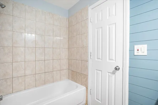 a bathroom with a bathtub