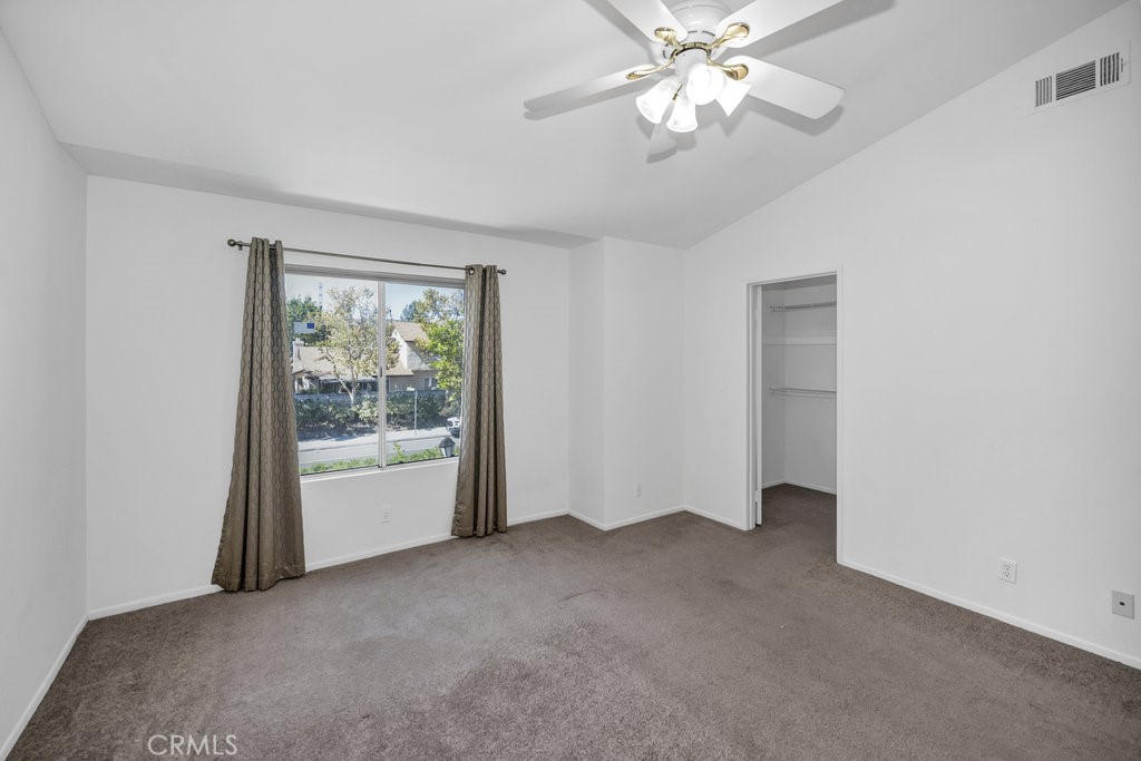 28114 Seco Canyon Road, Unit 156 Saugus, CA 91390 - Photo 15 of 31 a view of an empty room with a window