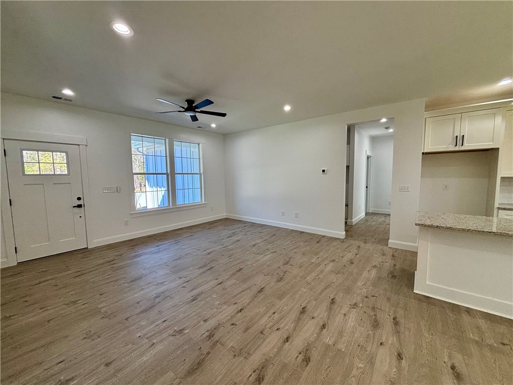 26 B Fisher Jenkins Road Anderson, SC 29625 - Photo 2 of 24 This bright and open-concept living space offers a welcoming atmosphere and modern finishes.