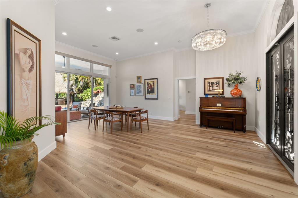 10171 Northwest 59th Drive Parkland, FL 33076 - Photo 16 of 49 a living room with furniture and a large window