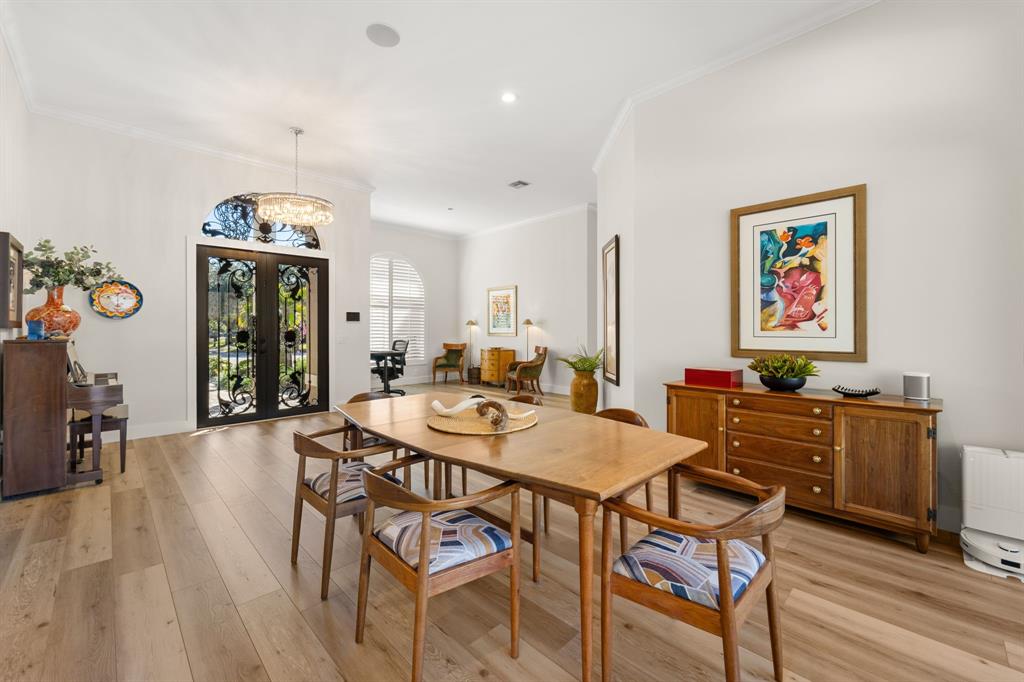10171 Northwest 59th Drive Parkland, FL 33076 - Photo 18 of 49 a view of a dining room with furniture window and wooden floor