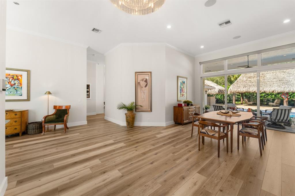 10171 Northwest 59th Drive Parkland, FL 33076 - Photo 19 of 49 a living room with furniture a window and a table