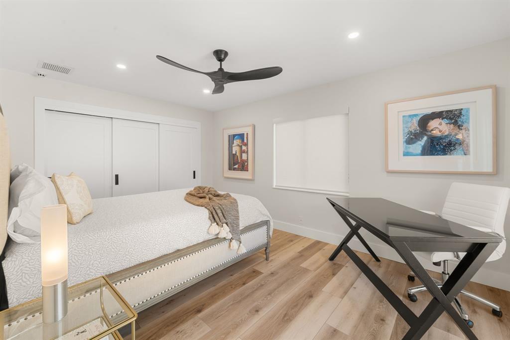 10171 Northwest 59th Drive Parkland, FL 33076 - Photo 21 of 49 a bed room with a bed and a chair