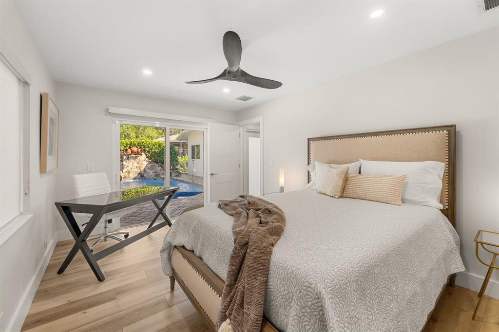 10171 Northwest 59th Drive Parkland, FL 33076 - Photo 31 of 49 a bedroom with a bed and a window