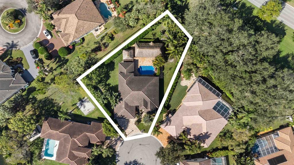 10171 Northwest 59th Drive Parkland, FL 33076 - Photo 40 of 49 an aerial view of a house