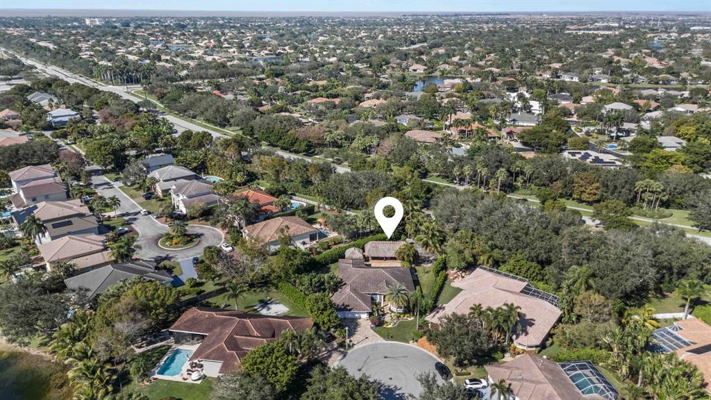 10171 Northwest 59th Drive Parkland, FL 33076 - Photo 42 of 49 an aerial view of a residential houses with outdoor space