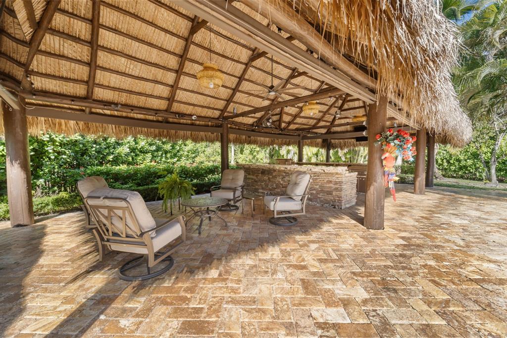 10171 Northwest 59th Drive Parkland, FL 33076 - Photo 47 of 49 a outdoor view with a sitting space