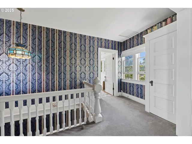 a view of a porch with wooden floor