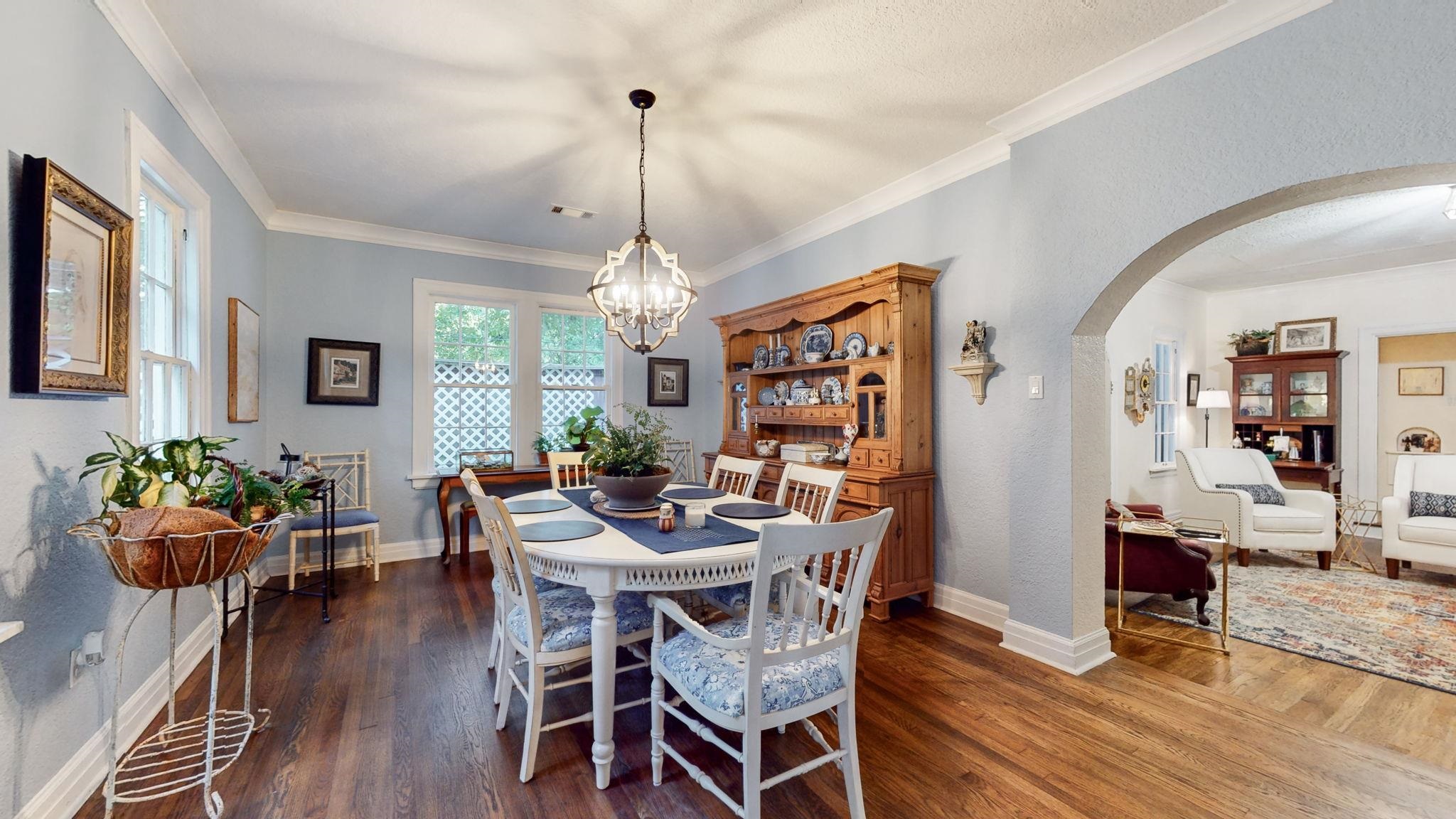 4572 Princeton Road Memphis, TN 38117 - Photo 9 of 36 a view of a dining room with furniture window and wooden floor