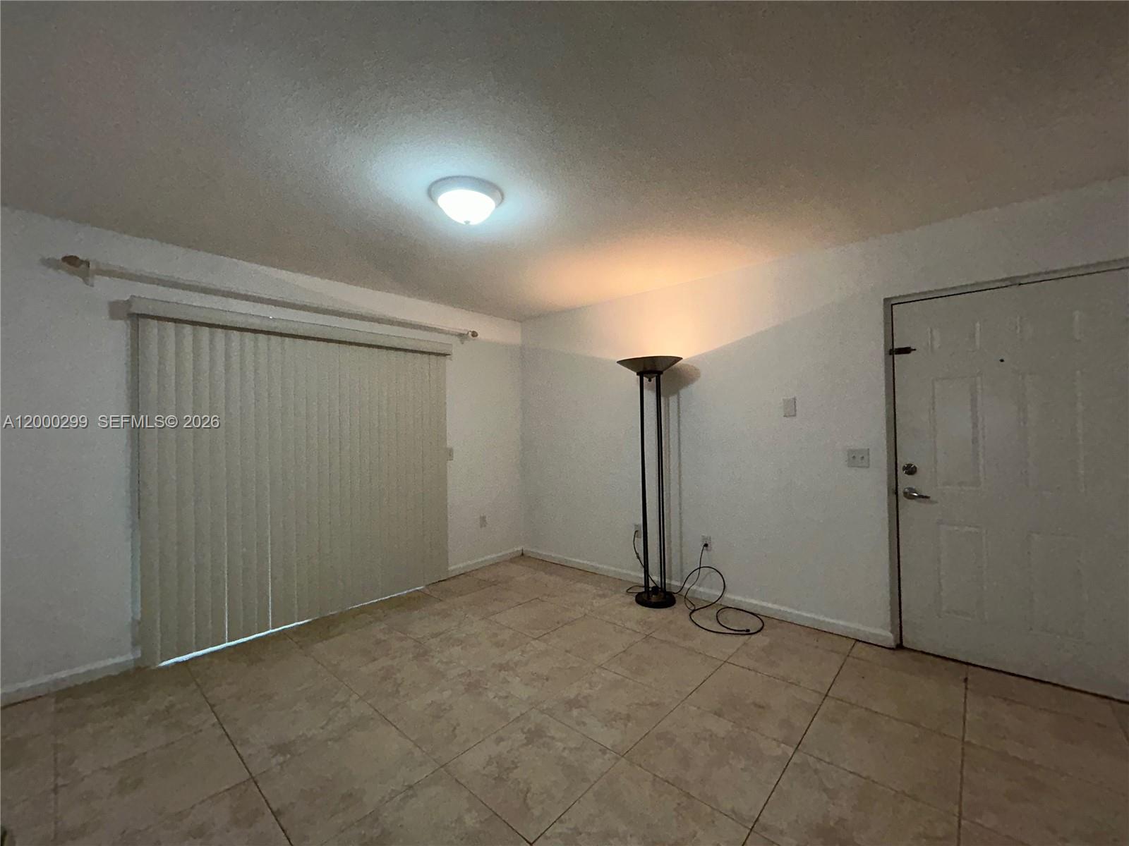 15470 Southwest 284th Street, Unit 3103 Homestead, FL 33033 - Photo 3 of 12 a view of an empty room