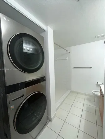 a view of a washer and dryer in a utility room