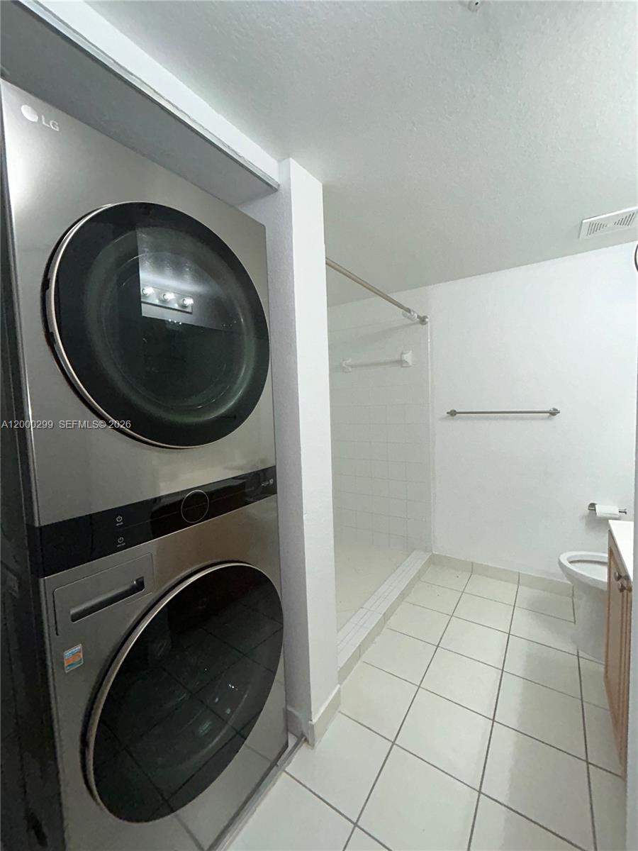 15470 Southwest 284th Street, Unit 3103 Homestead, FL 33033 - Photo 7 of 12 a view of a washer and dryer in a utility room