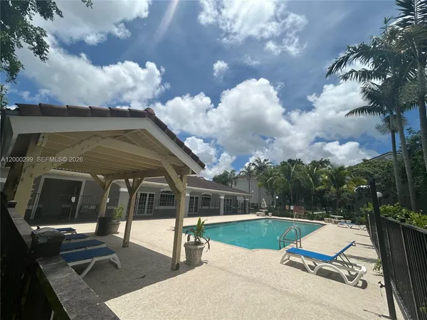a view of a house with a swimming pool