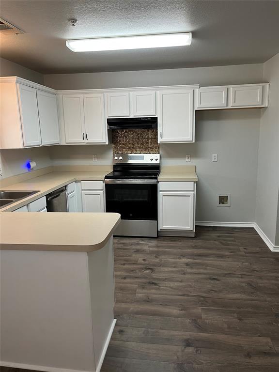403 East R Ellis Avenue Fate, TX 75087 - Photo 8 of 15 a kitchen with a sink cabinets and appliances