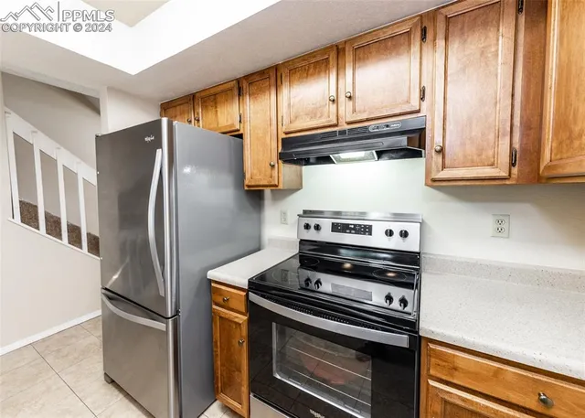 a bathroom with a sink a vanity and a mirror
