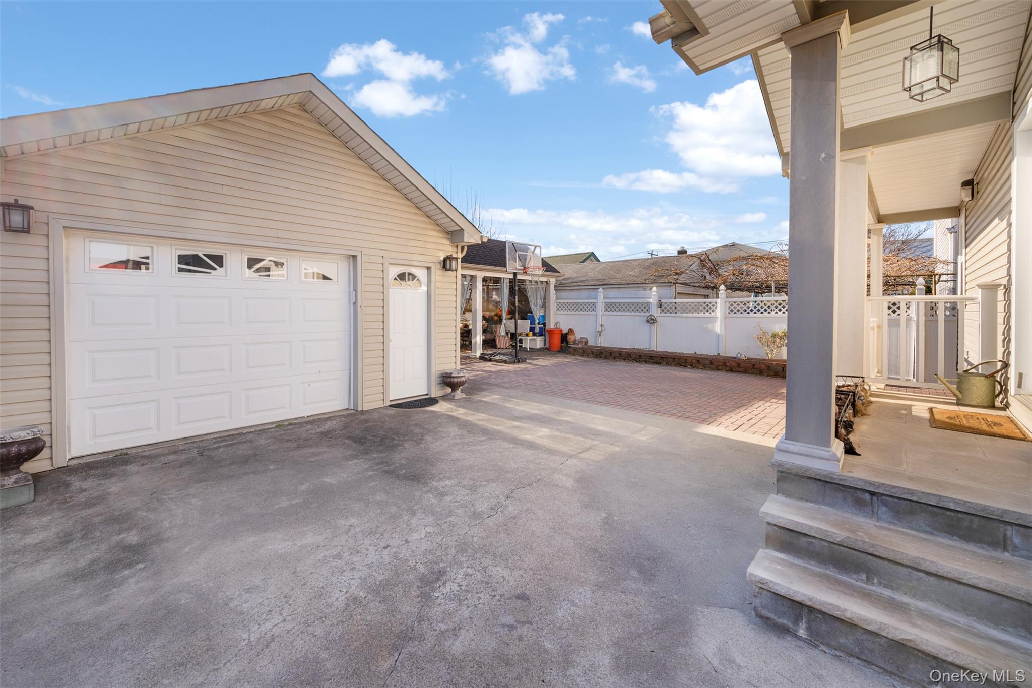 215 Rudolf Road Mineola, NY 11501 - Photo 4 of 14 a view of a house with porch