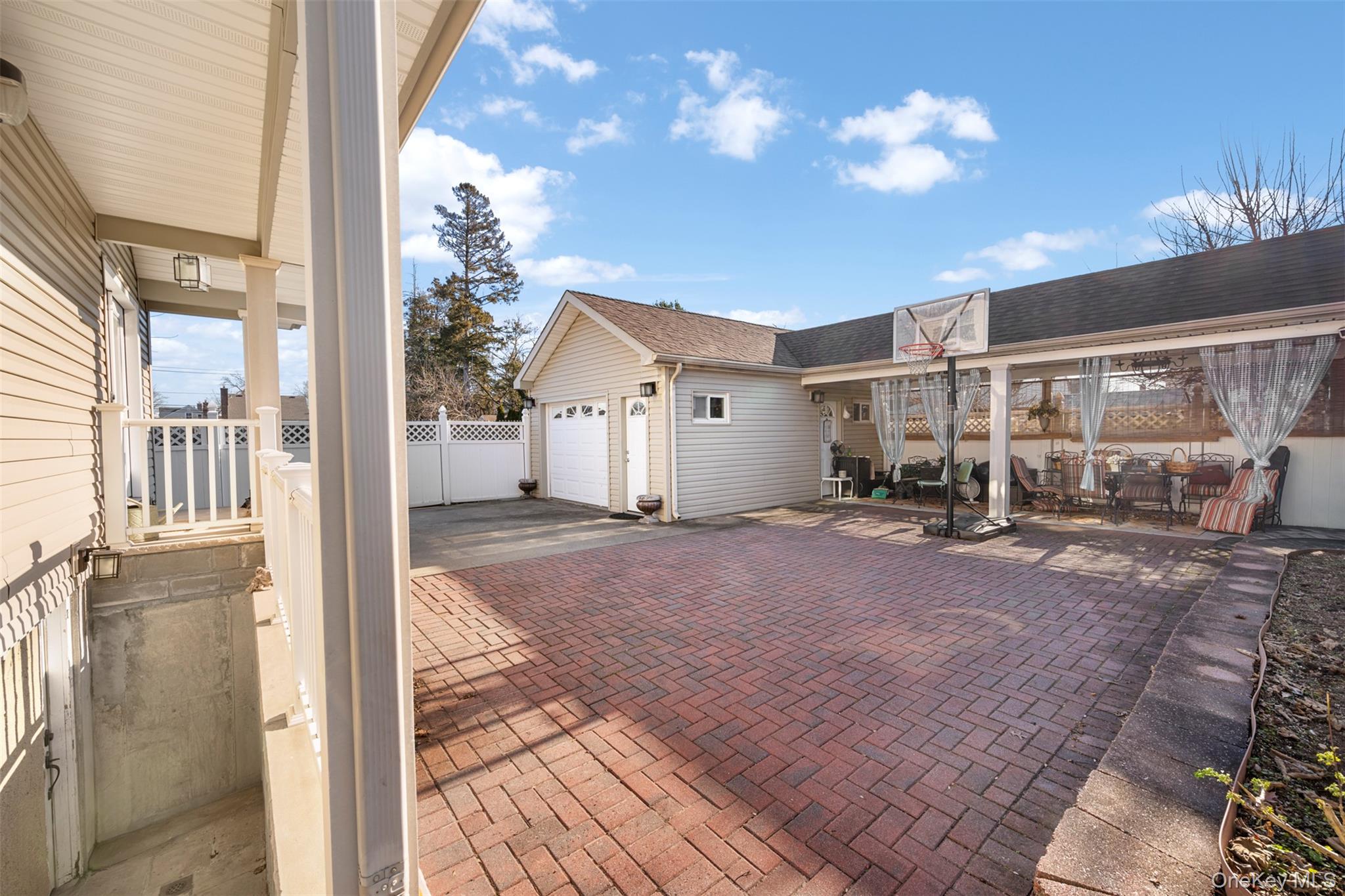 215 Rudolf Road Mineola, NY 11501 - Photo 5 of 14 a house view with a outdoor space