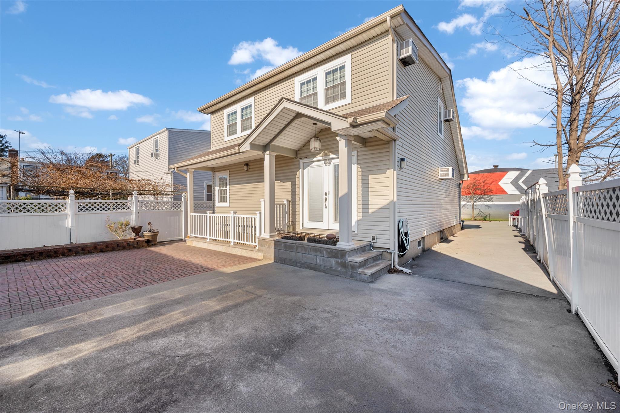 215 Rudolf Road Mineola, NY 11501 - Photo 9 of 14 a view of a house with a street