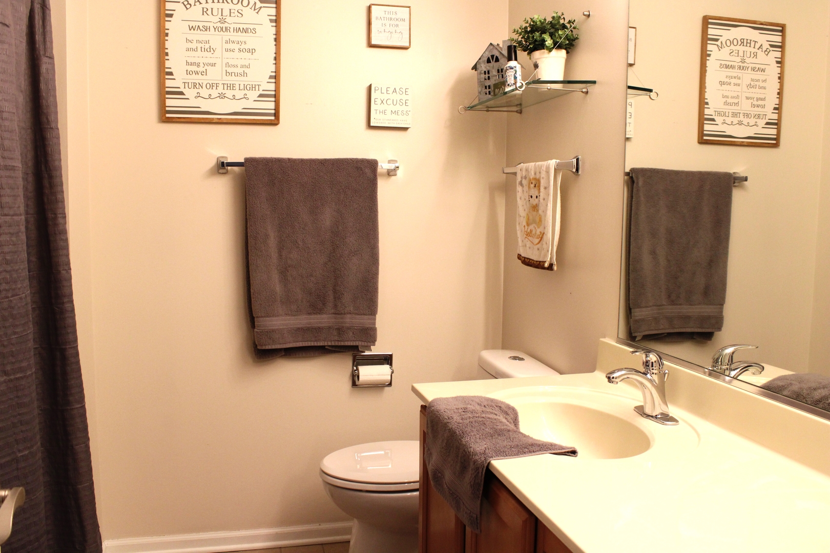 2560 Golf Ridge Circle, Unit 2560 Naperville, IL 60563 - Photo 4 of 16 a bathroom with a sink vanity mirror and toilet