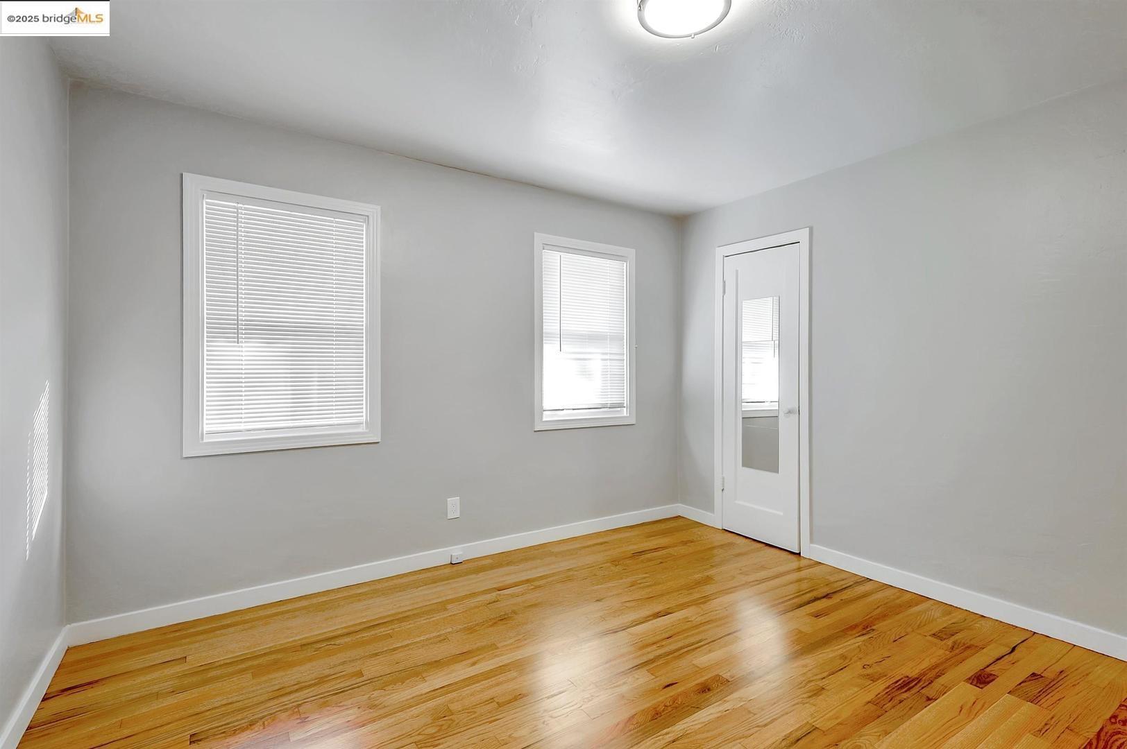 2118 California Street Berkeley, CA 94703 - Photo 28 of 34 a view of empty room with wooden floor