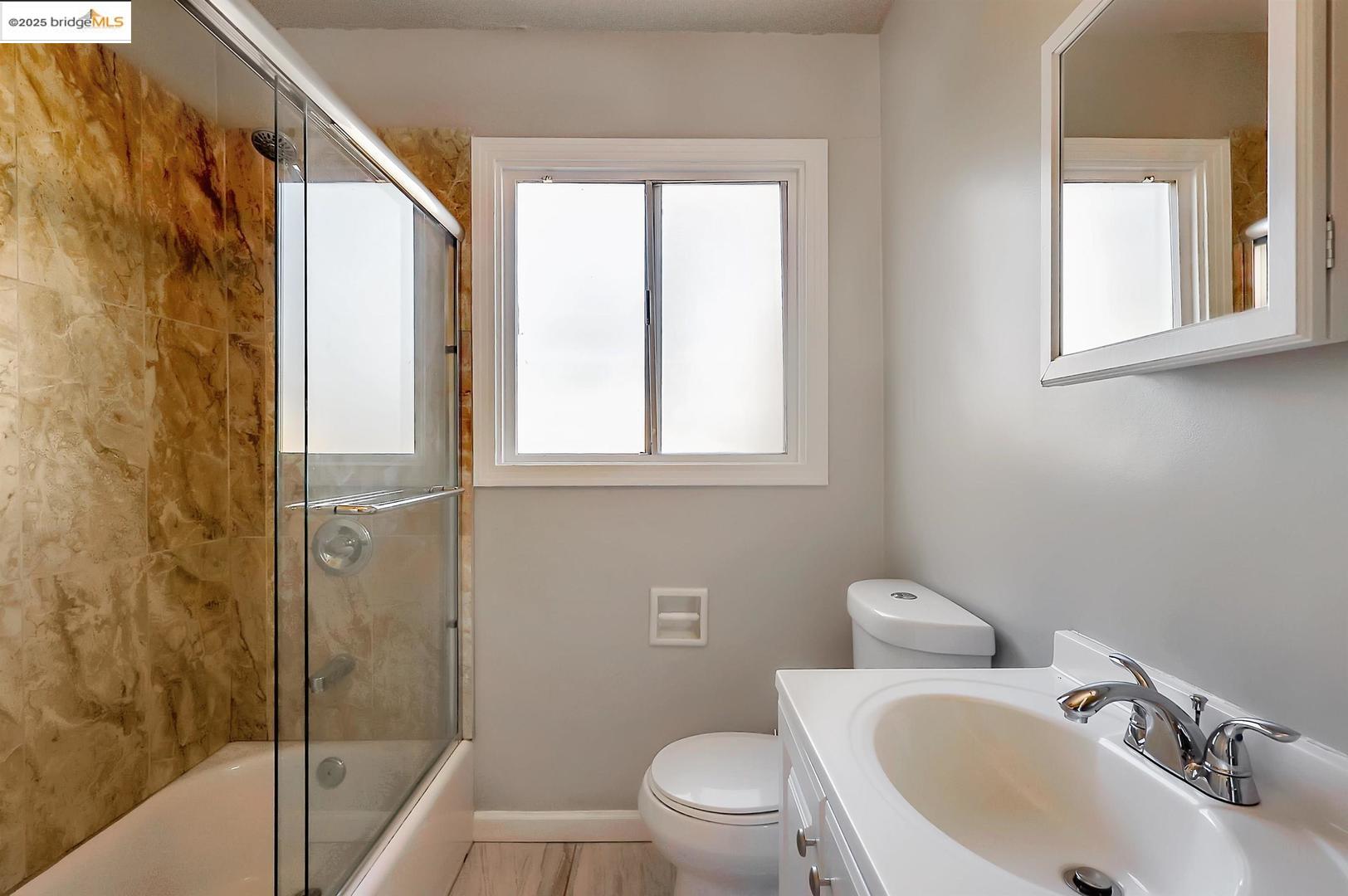2118 California Street Berkeley, CA 94703 - Photo 33 of 34 a bathroom with a sink toilet and shower