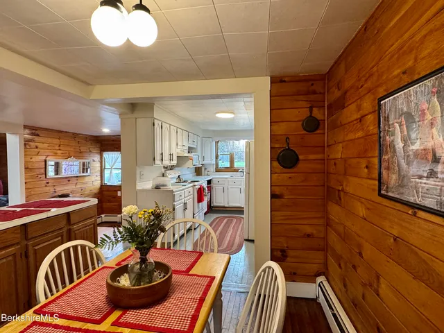 a dinning room with furniture