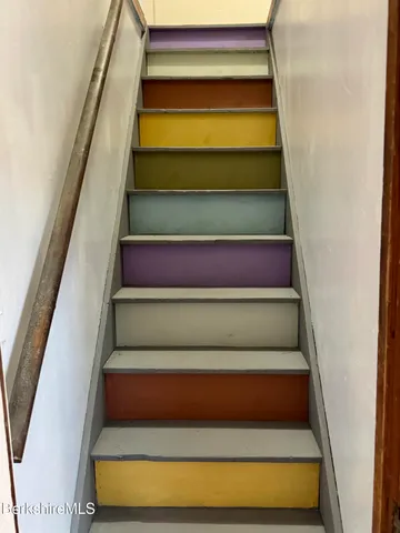 a bedroom with a bed