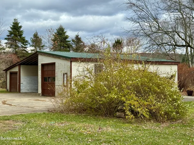 a view of a backyard of the house