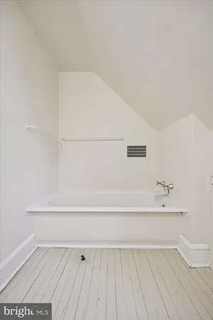 a view of bathroom with bathtub